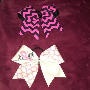 Pink and black strip bow and believe bow